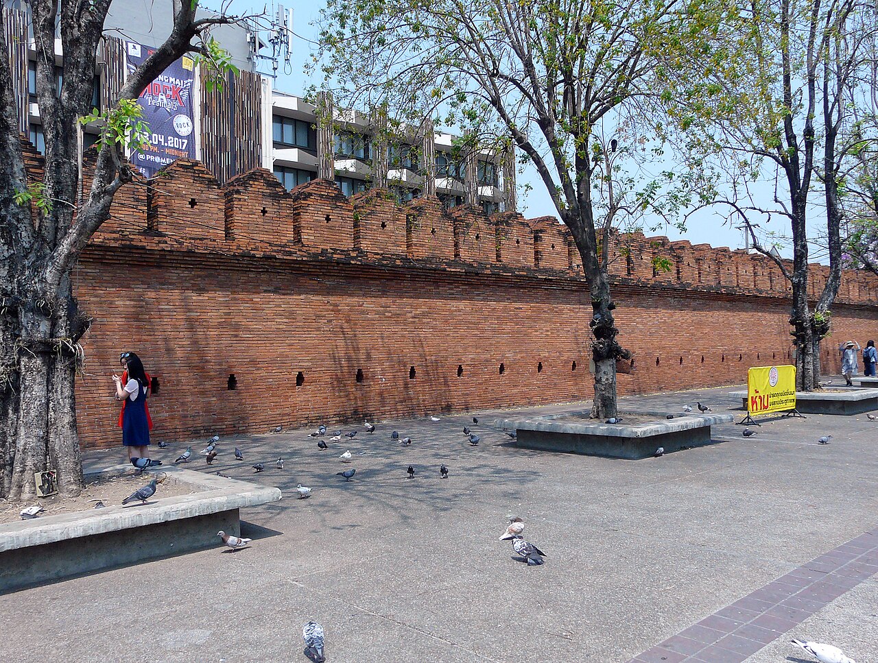 Tha Phae Gate in Chiang Mai — the old red-brick city wall and the open square at the heart of the old town
