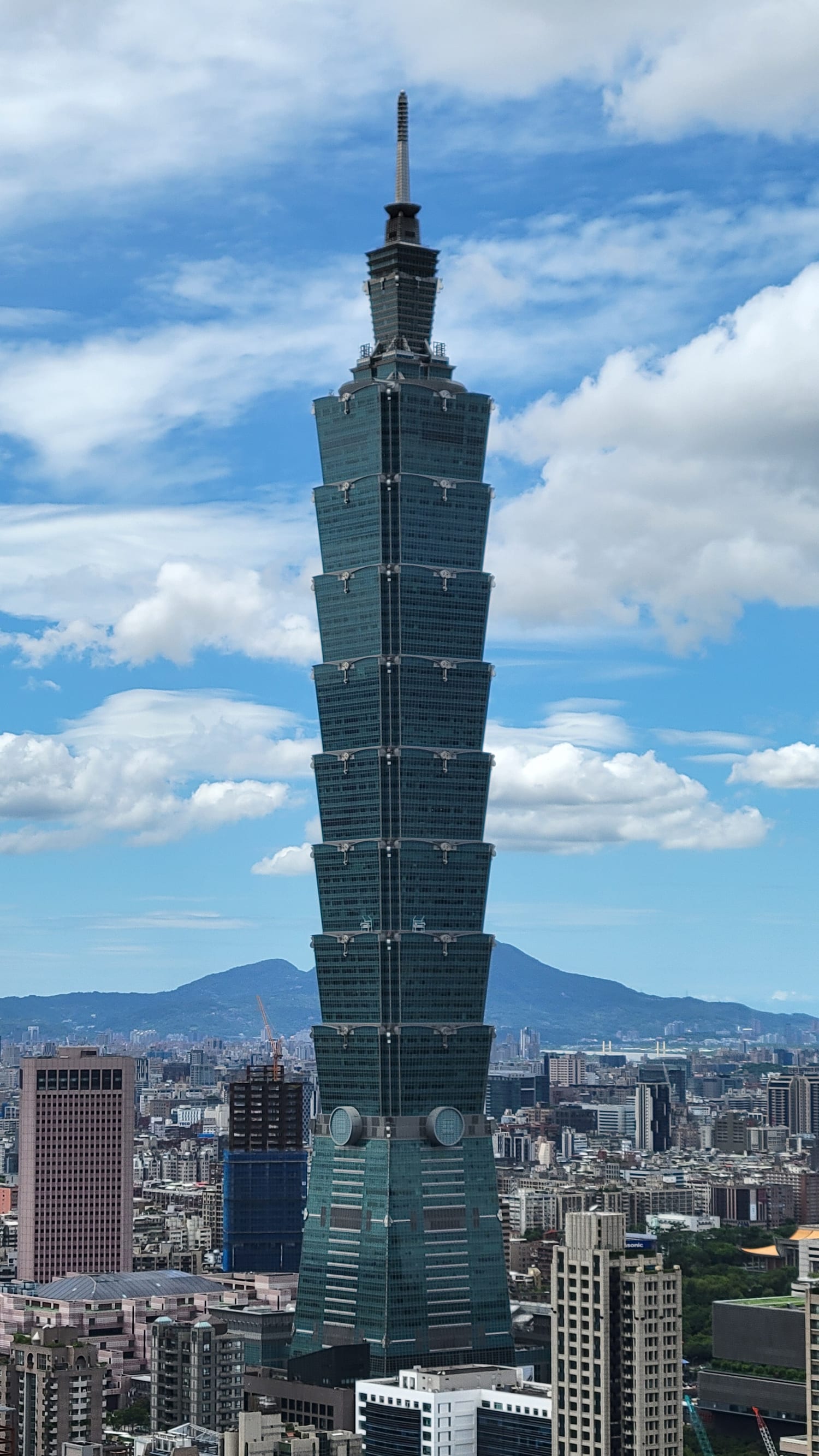 Taipei 101 rising tall over the city skyline, seen from the Elephant Mountain (Xiangshan) hiking trail in Taipei
