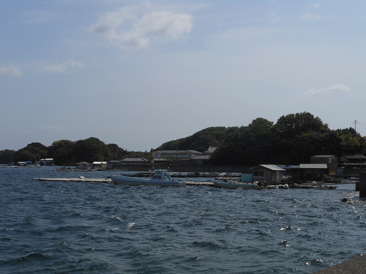 Ago Bay Mie pearl farms and fishing boats on blue water