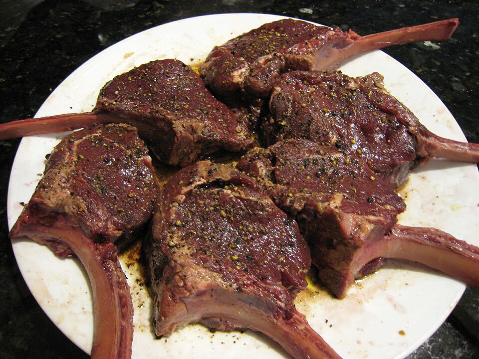 Grilled elk meat sliced and plated