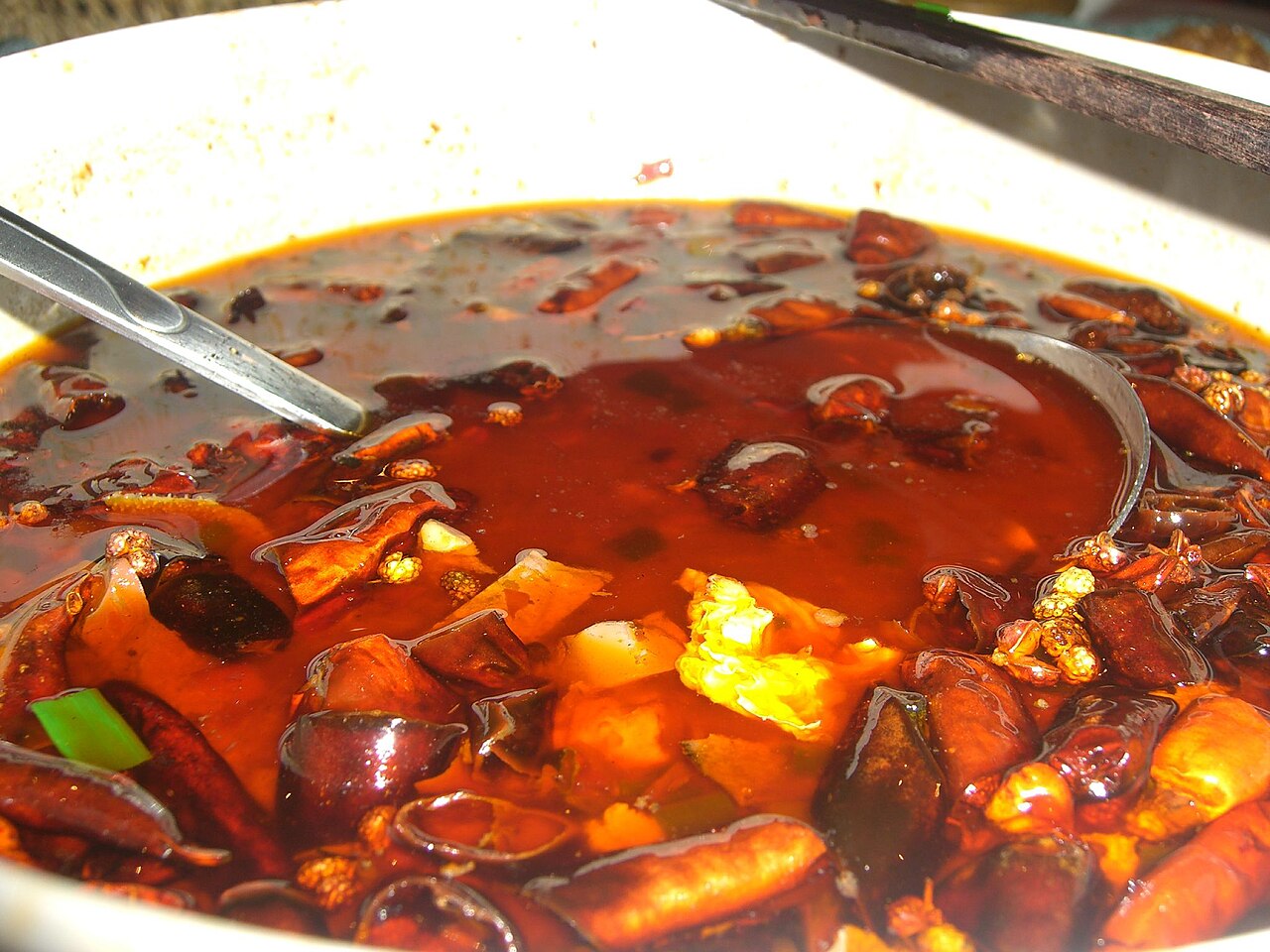 Maoxuewang — a bubbling pot of deep-red chilli broth with duck blood, offal and dried chillies floating in a film of chilli oil