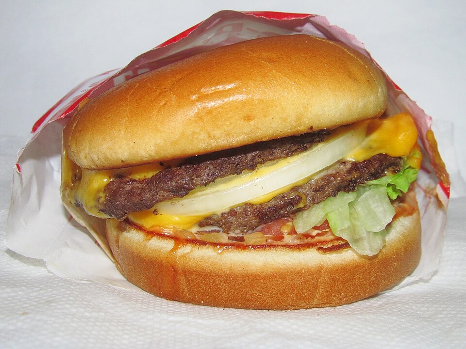 In-N-Out Double-Double burger with two patties and two cheese slices in wrapper