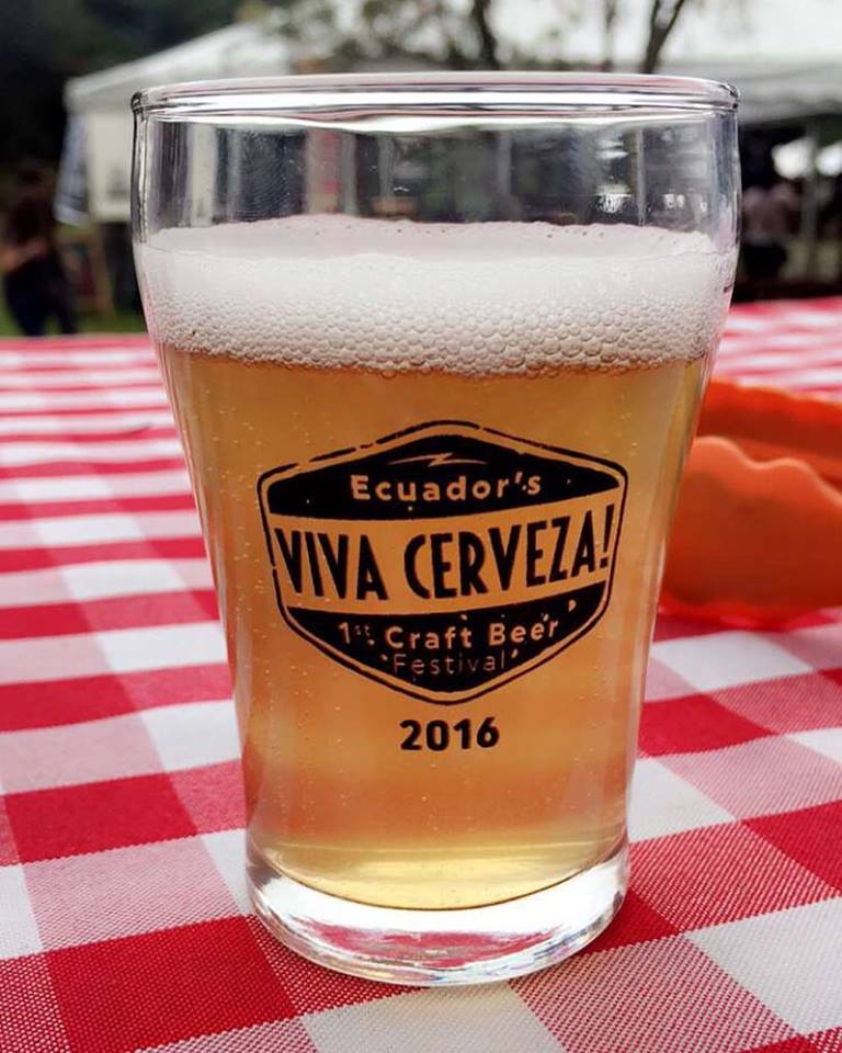 A glass of craft beer in a brewery setting