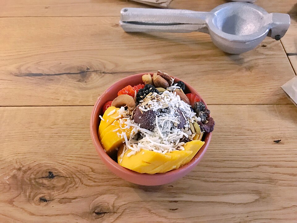 Acai bowl with fruit and granola in a bowl