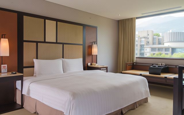 Wood-toned guest room
