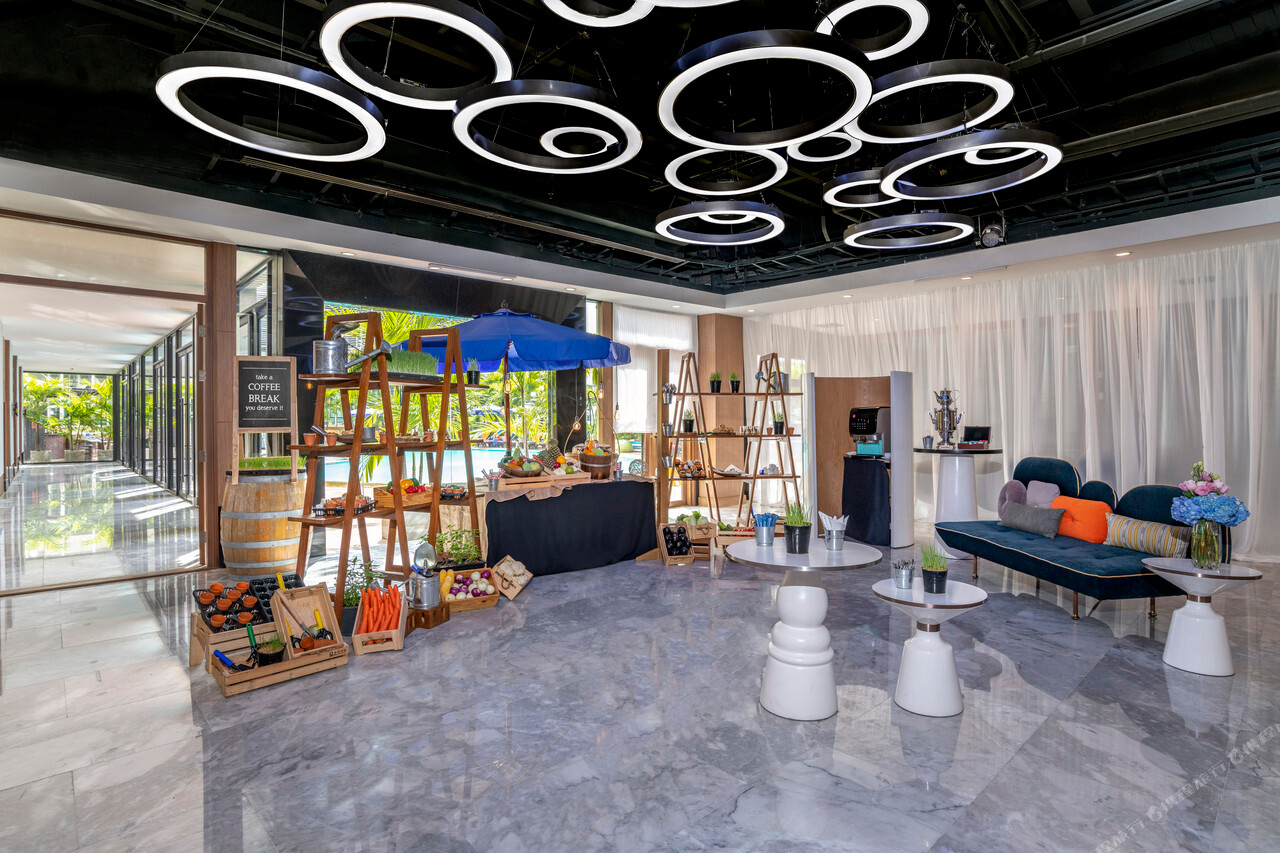 Renovated communal space with circular ring lighting overhead