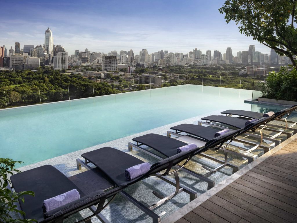 SO/ Bangkok infinity pool looking across Lumpini Park and the Bangkok skyline