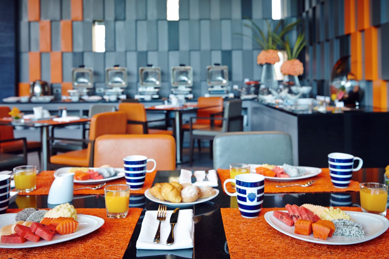 Breakfast buffet in the hotel's orange-and-grey dining room