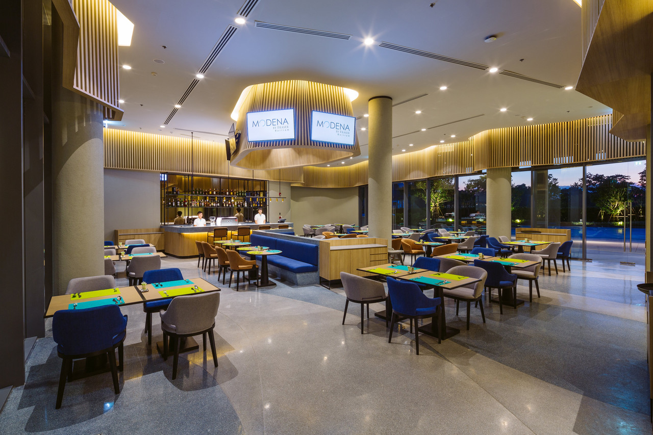 Bistro@M restaurant at Modena by Fraser Buriram with hotel signage