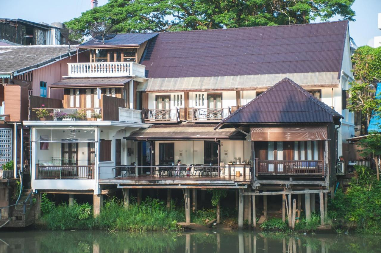 Baan Luang Rajamaitri wooden house on the Chanthaboon River, seen from the opposite bank
