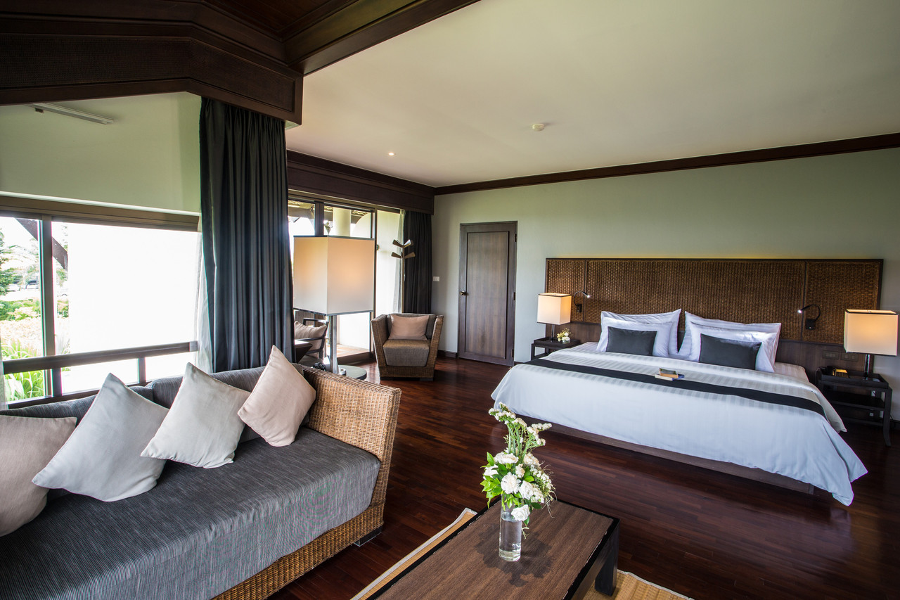 Spacious Junior Suite with timber floors and a sitting area