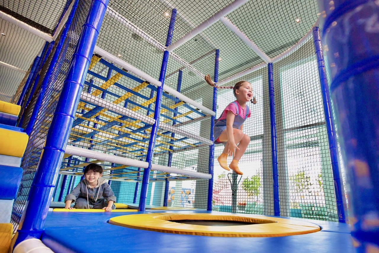455-square-metre indoor Kids Club with climbing frames and a bounce room