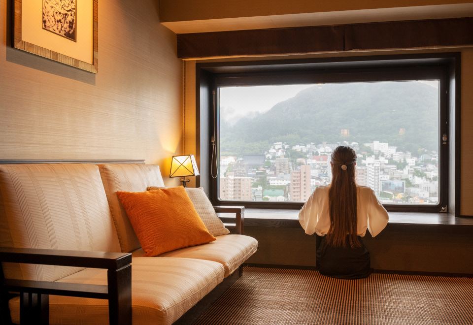 La Vista Hakodate Bay guestroom with Taisho-retro decor and mountain city view