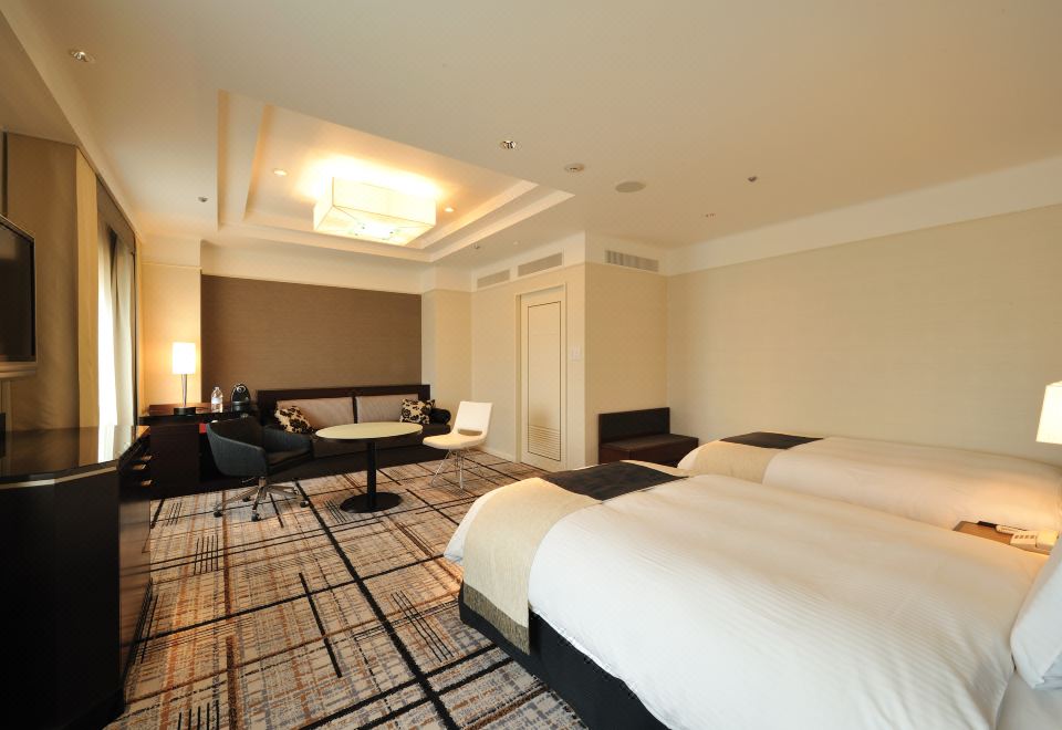 Granvia Floor superior room with sitting area, larger layout with city views