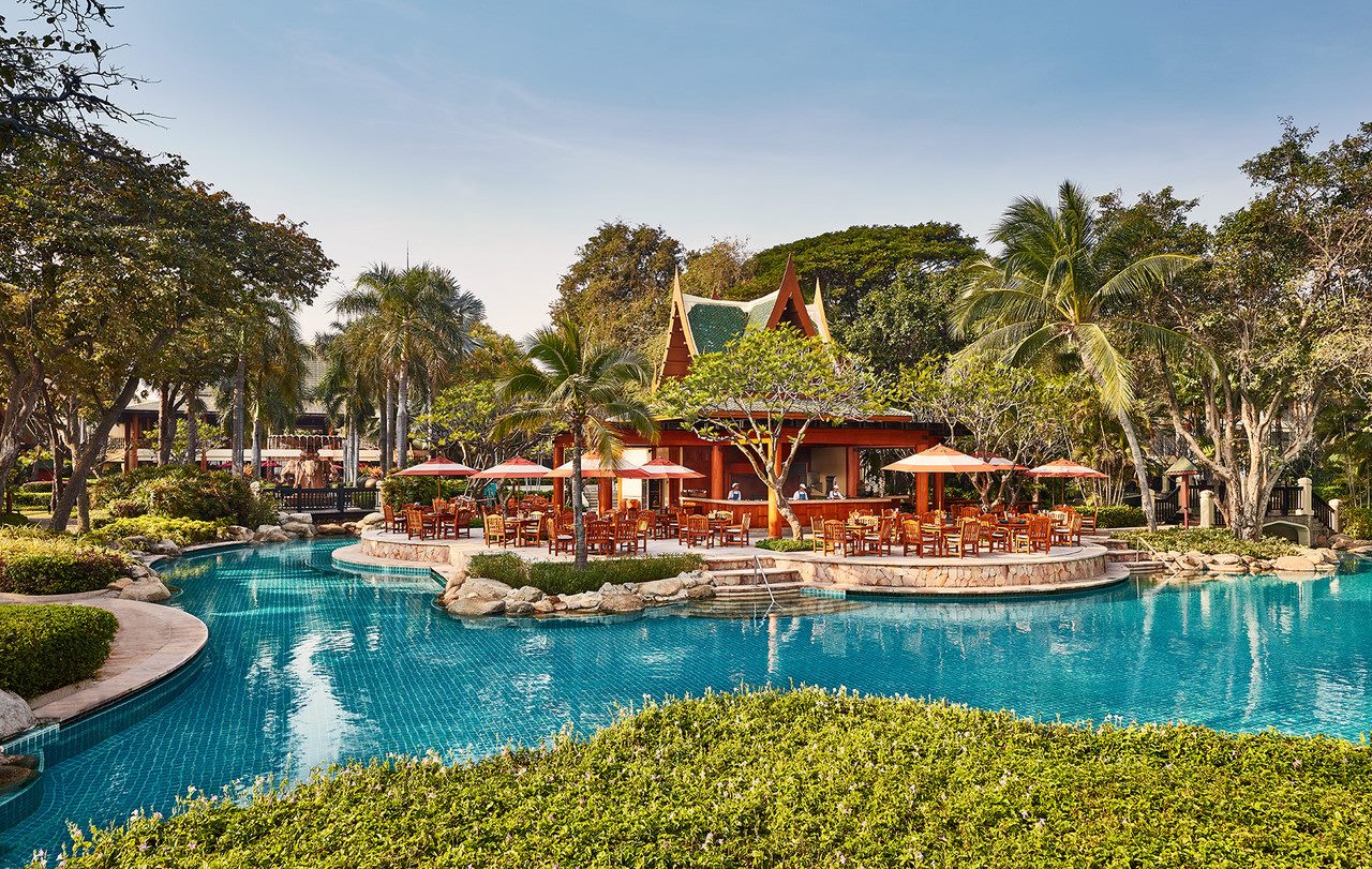 Green-roofed Thai pavilion beside the lagoon pool at Hyatt Regency Hua Hin
