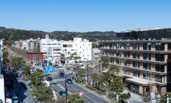 View from Hotel Metropolitan Kamakura overlooking Wakamiya Oji Avenue and the red torii gate of Tsurugaoka Hachimangu Shrine