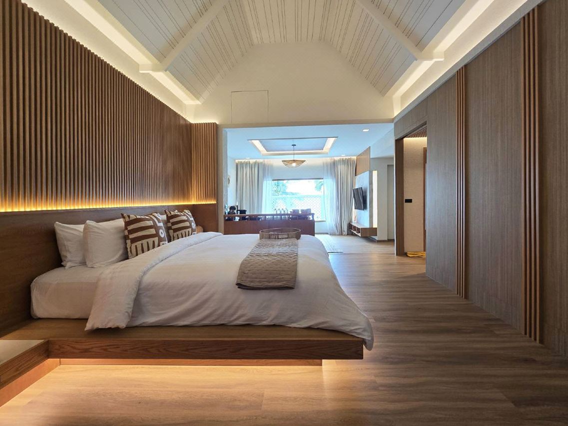 Cocohut Village Pool Suite with a vaulted timber ceiling and resort styling