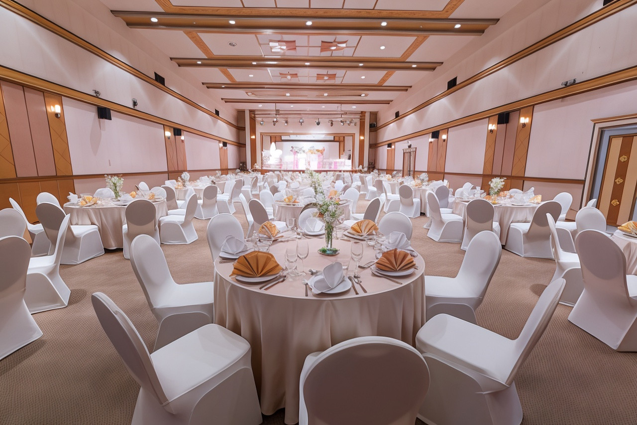 Banquet ballroom set with round tables for a wedding