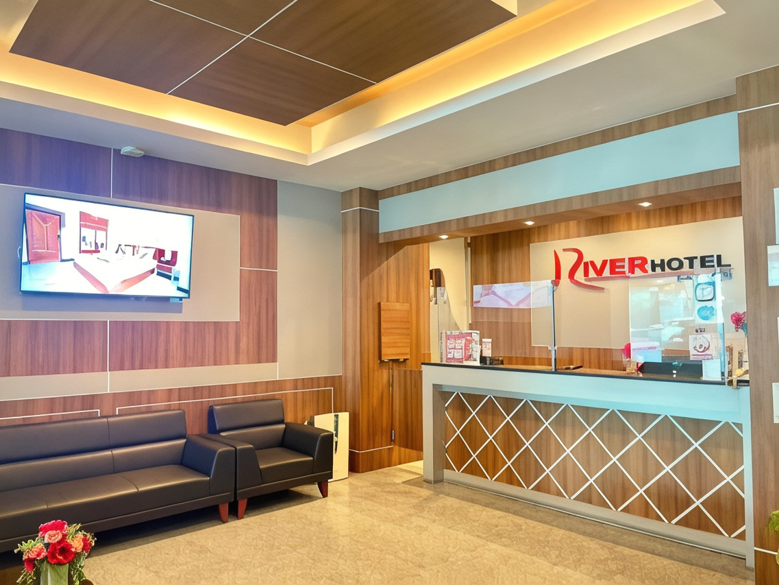 ล็อบบี้และเคาน์เตอร์ต้อนรับ River Hotel Pattani โทนไม้