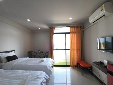 Twin Superior room at The Rooms Residence with two beds, air conditioning and a balcony