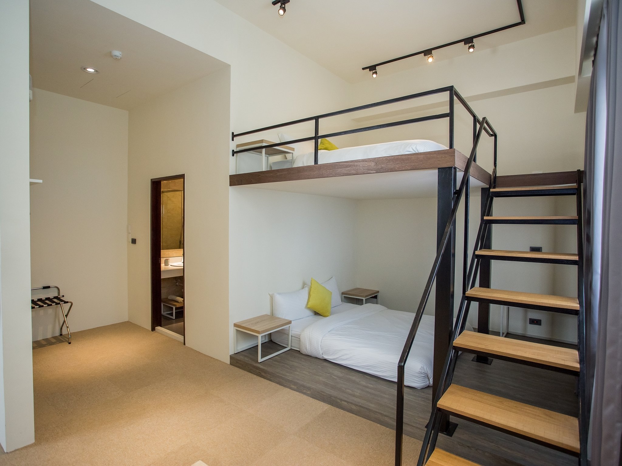 Room interior at Rainbow Hotel Penghu showing colourful decor