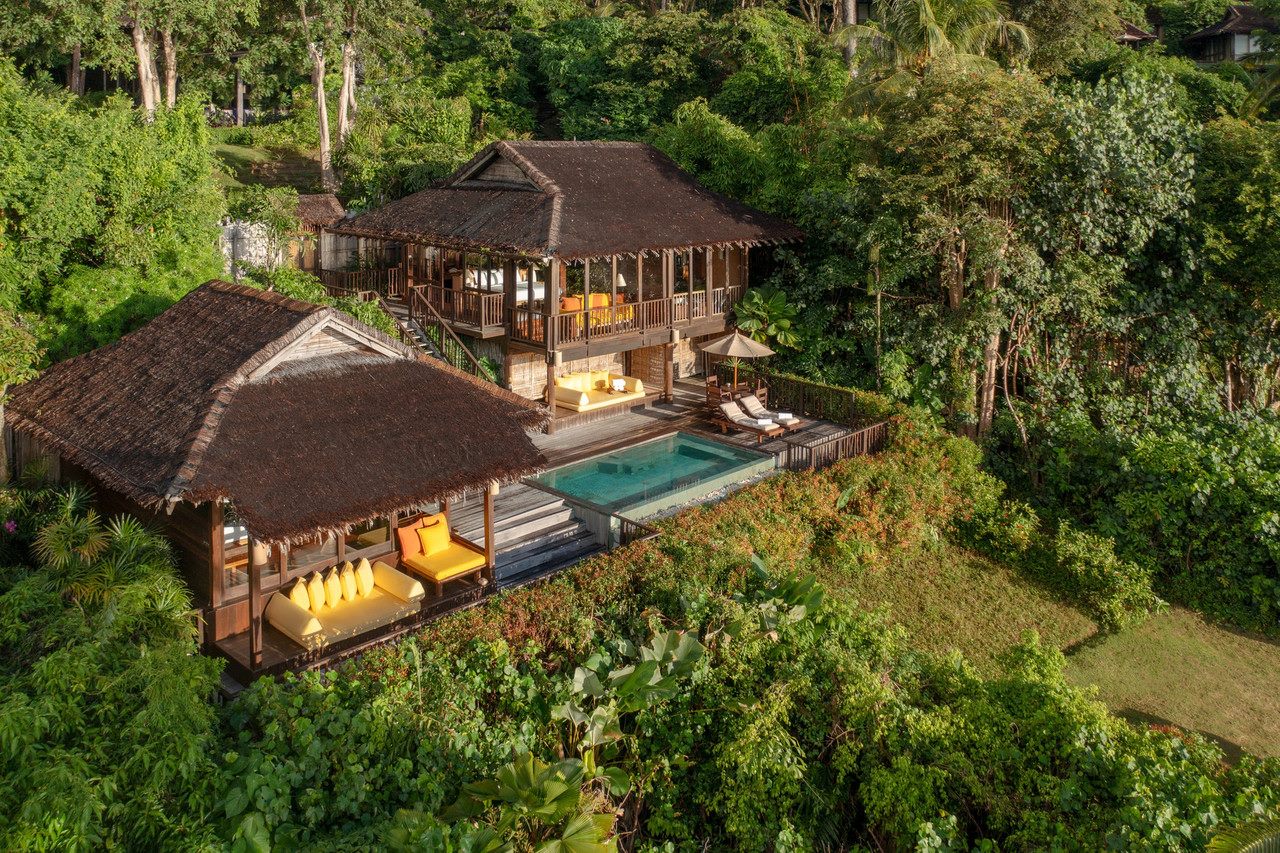 Two-storey villa with a private infinity pool surrounded by greenery