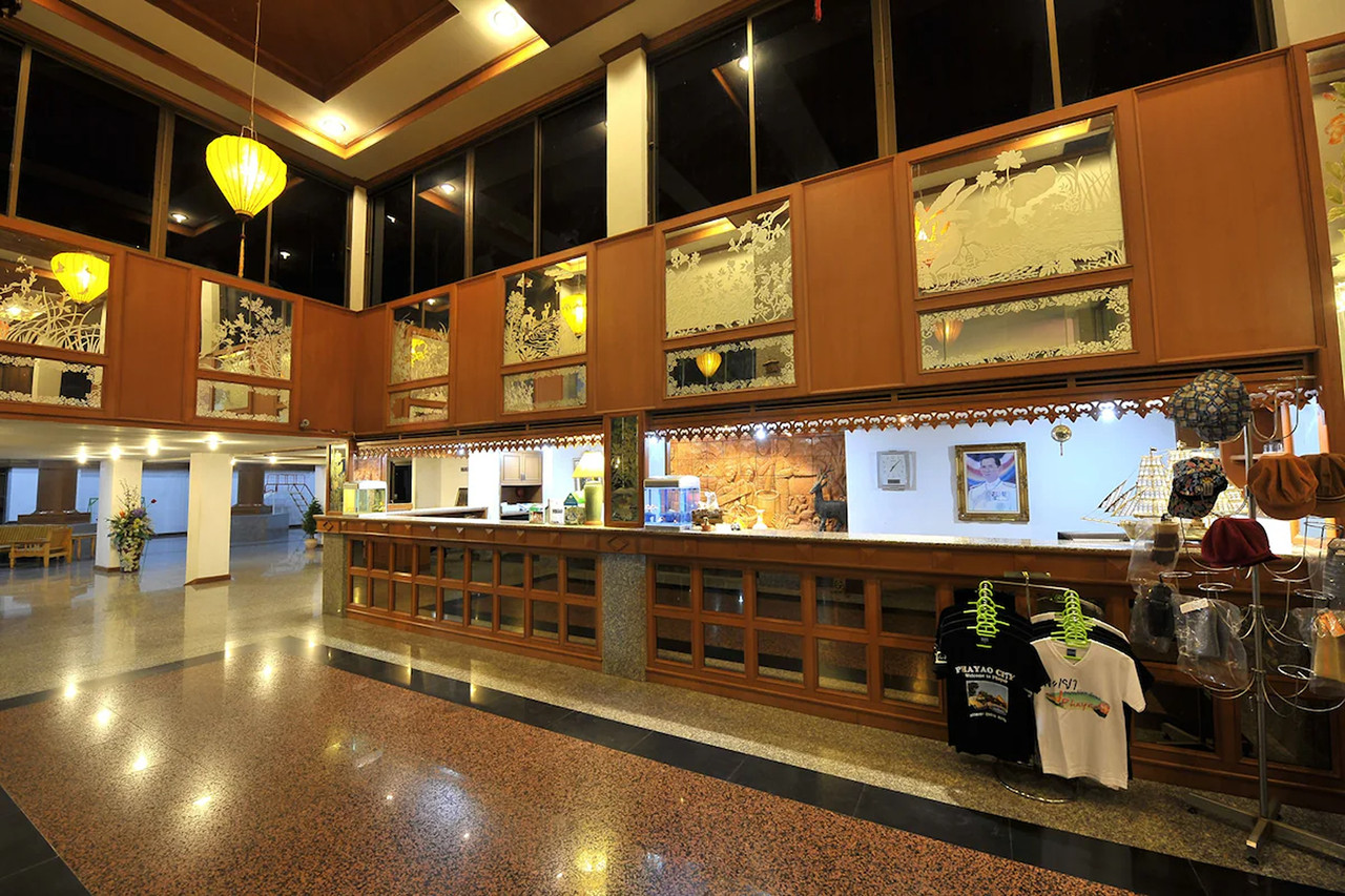 Lanna-style timber lobby and reception desk at Phayao Lake Hotel