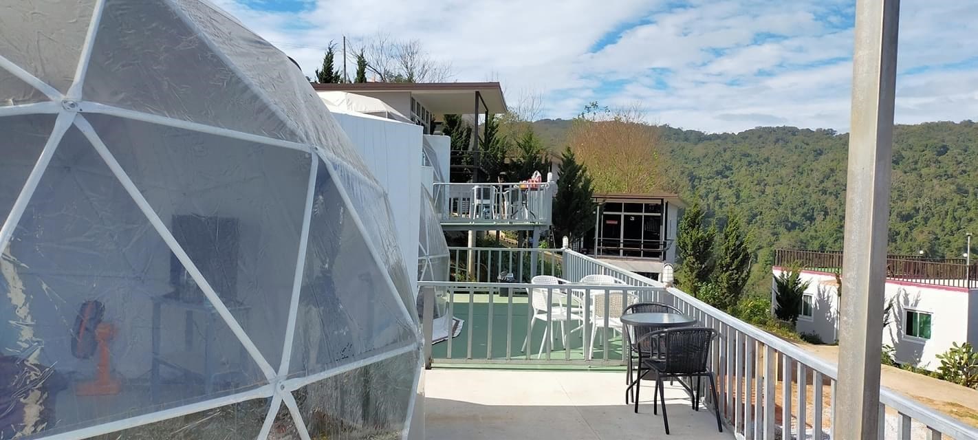 Clear dome tent and a private terrace with mountain views at Tubburk Glamping on Phu Thap Boek