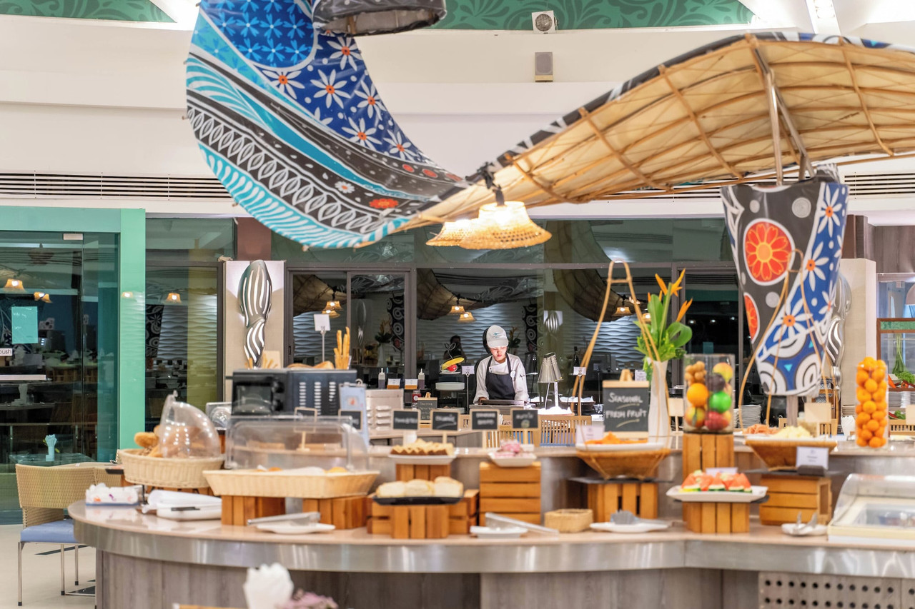 Gourmet@Sea buffet restaurant decorated with boat and local-textile motifs