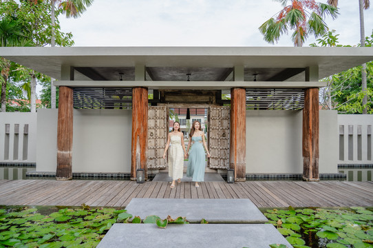 Teak entrance pavilion over the lotus lake at Pattara Resort & Spa Phitsanulok