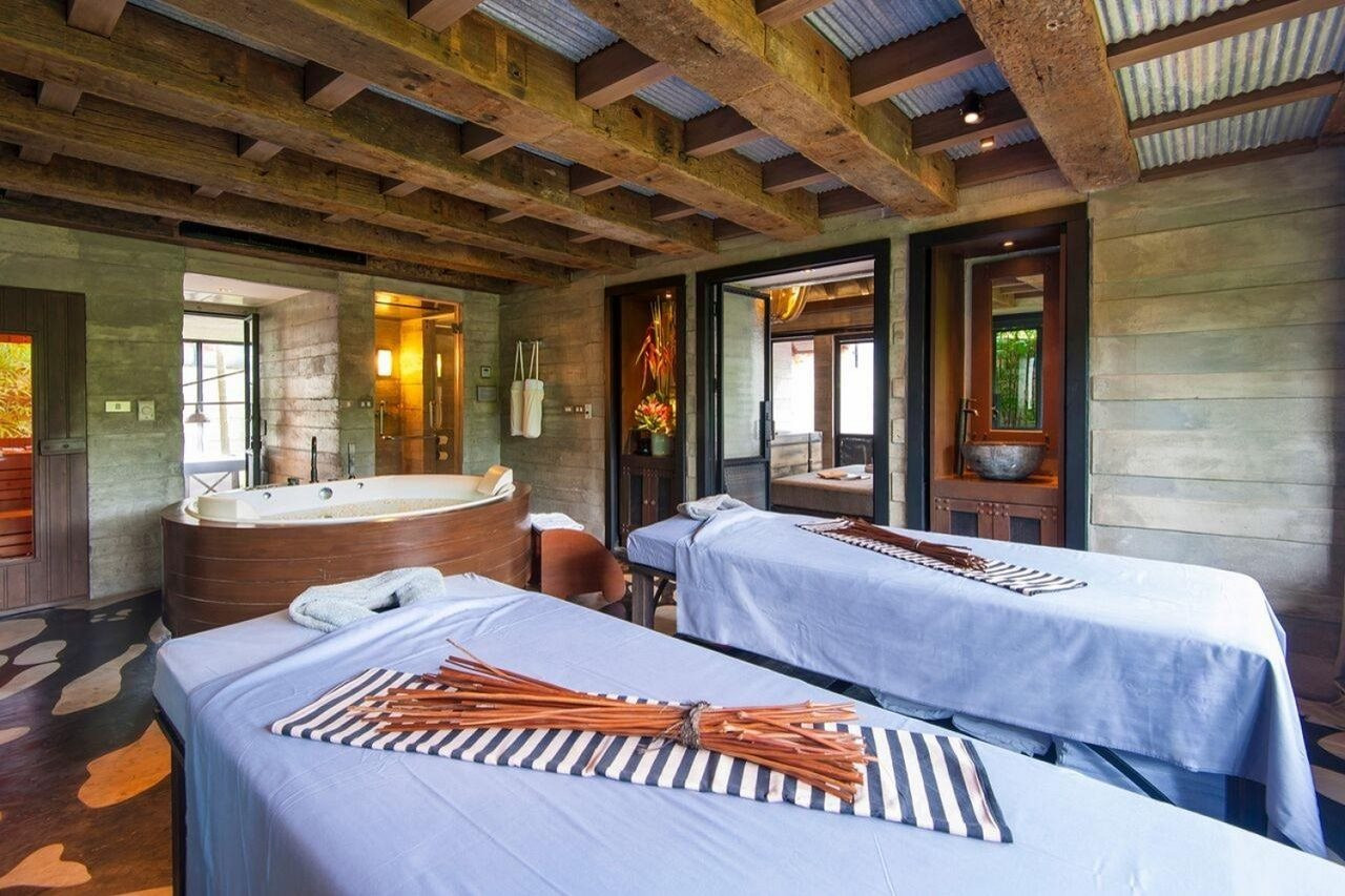 Coqoon Spa treatment room with a corrugated-tin mining-theme ceiling