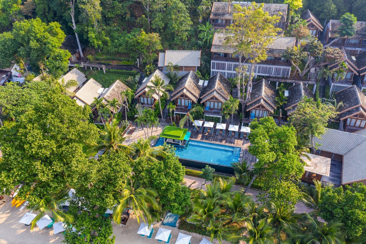Aerial view of Ao Prao Resort's cottages and swimming pool set in the gardens