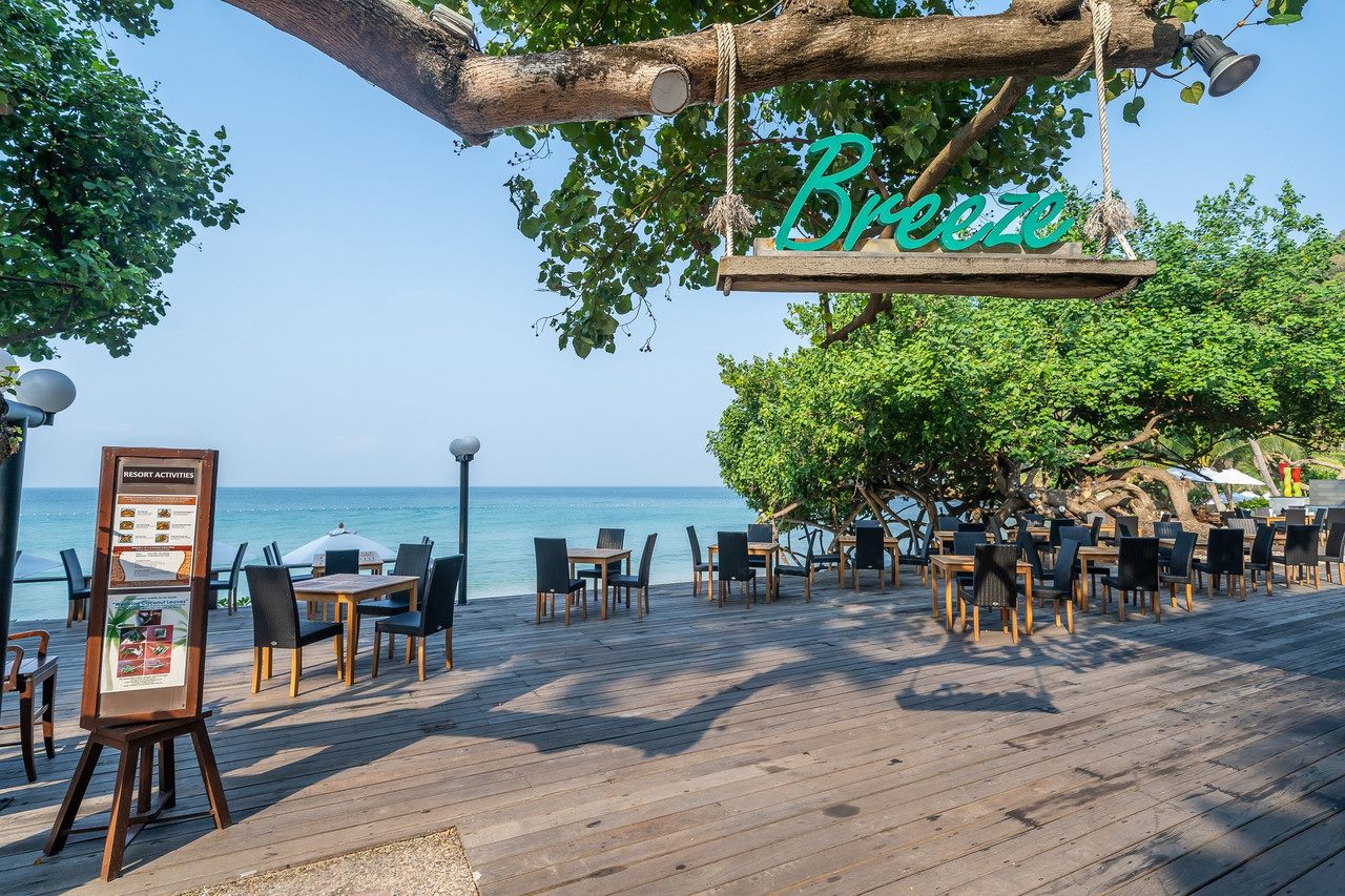 Breeze beachfront restaurant at Ao Prao with its wooden sign and sea view