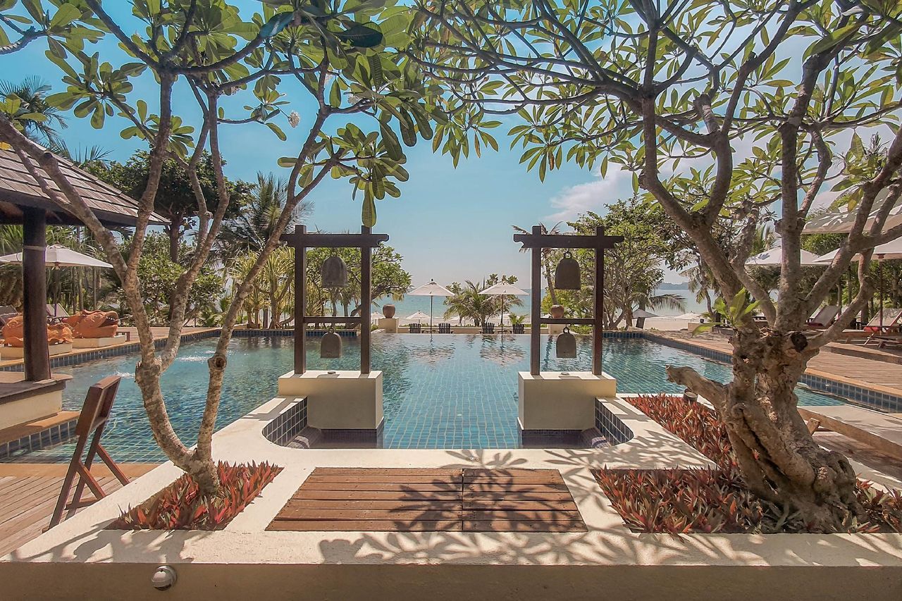 Beachfront infinity pool at Le Vimarn looking out over Ao Prao bay