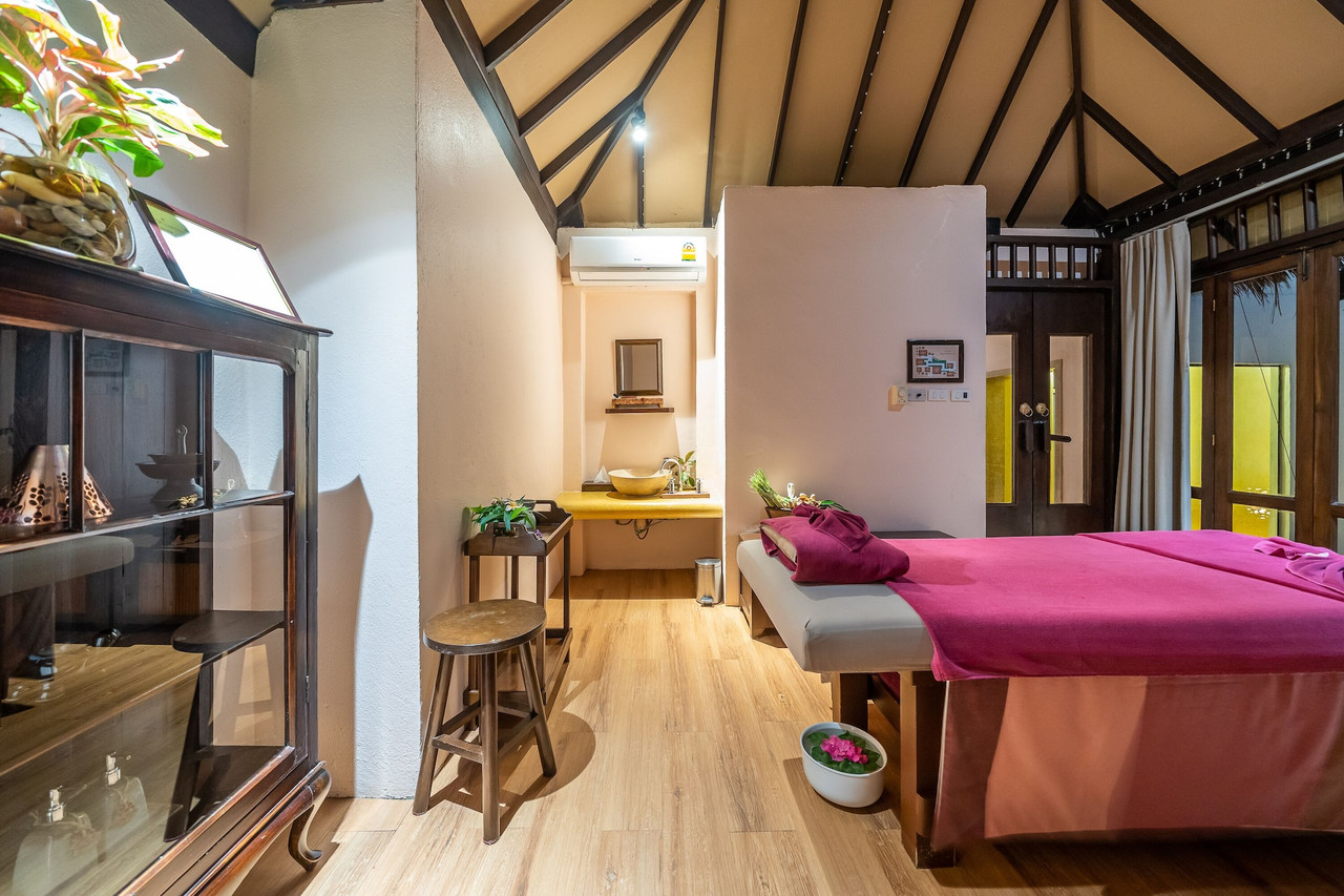 Dhivarin Spa treatment room under a wooden pavilion roof