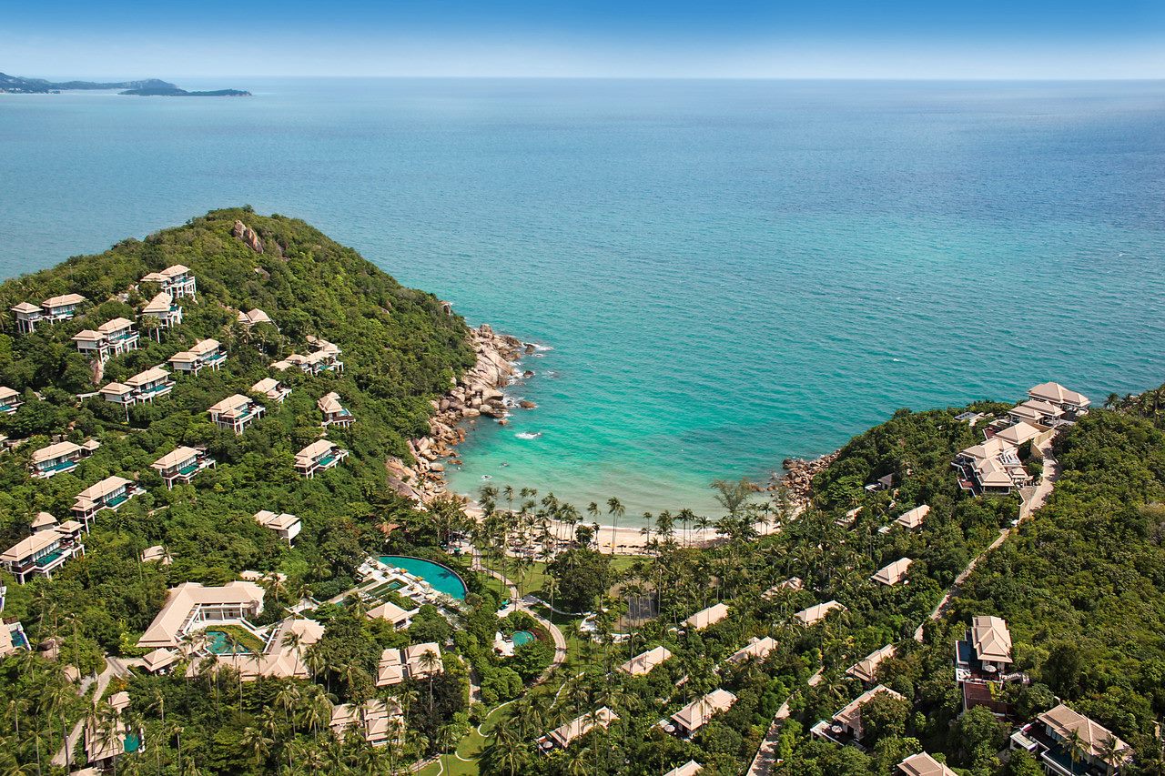 Aerial view of the resort cascading down to its private Lamai Bay beach