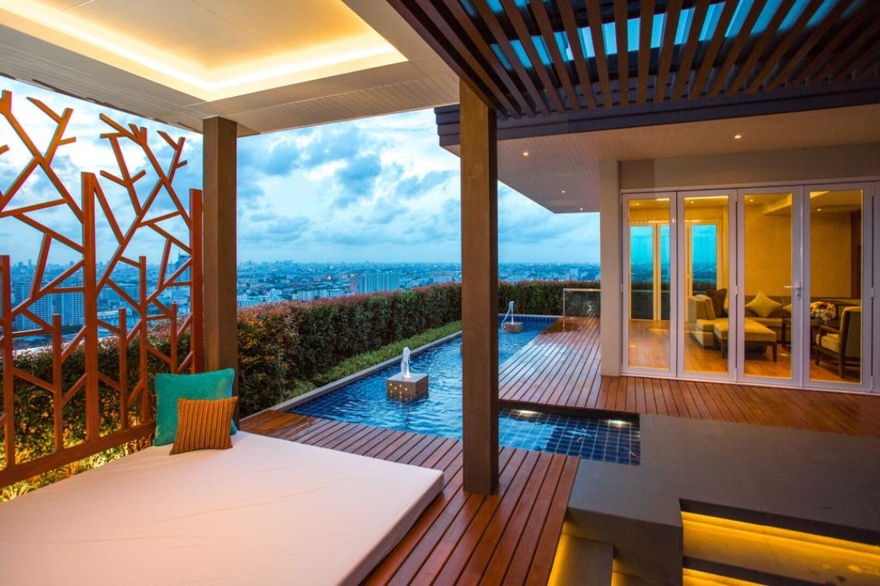 10th-floor sky pool with city views at The Grand Fourwings