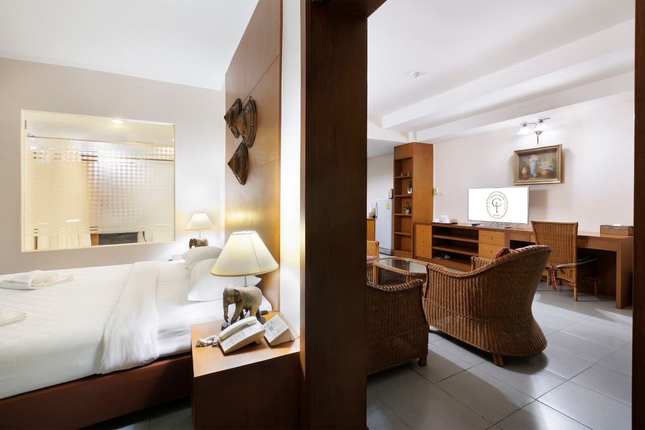 One-Bedroom Suite with a separate sitting area and work desk