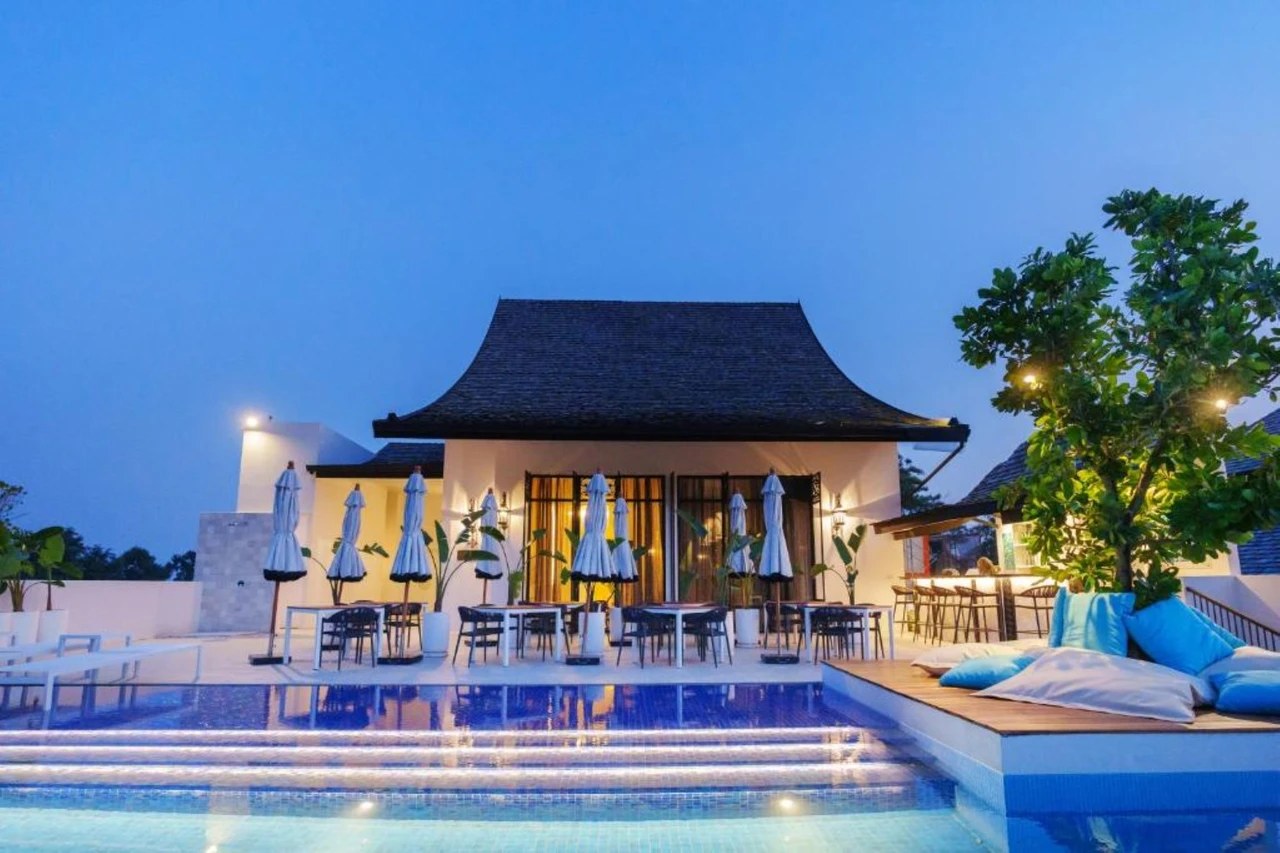 The Soul Resort pool and Petra Pool Bar at dusk