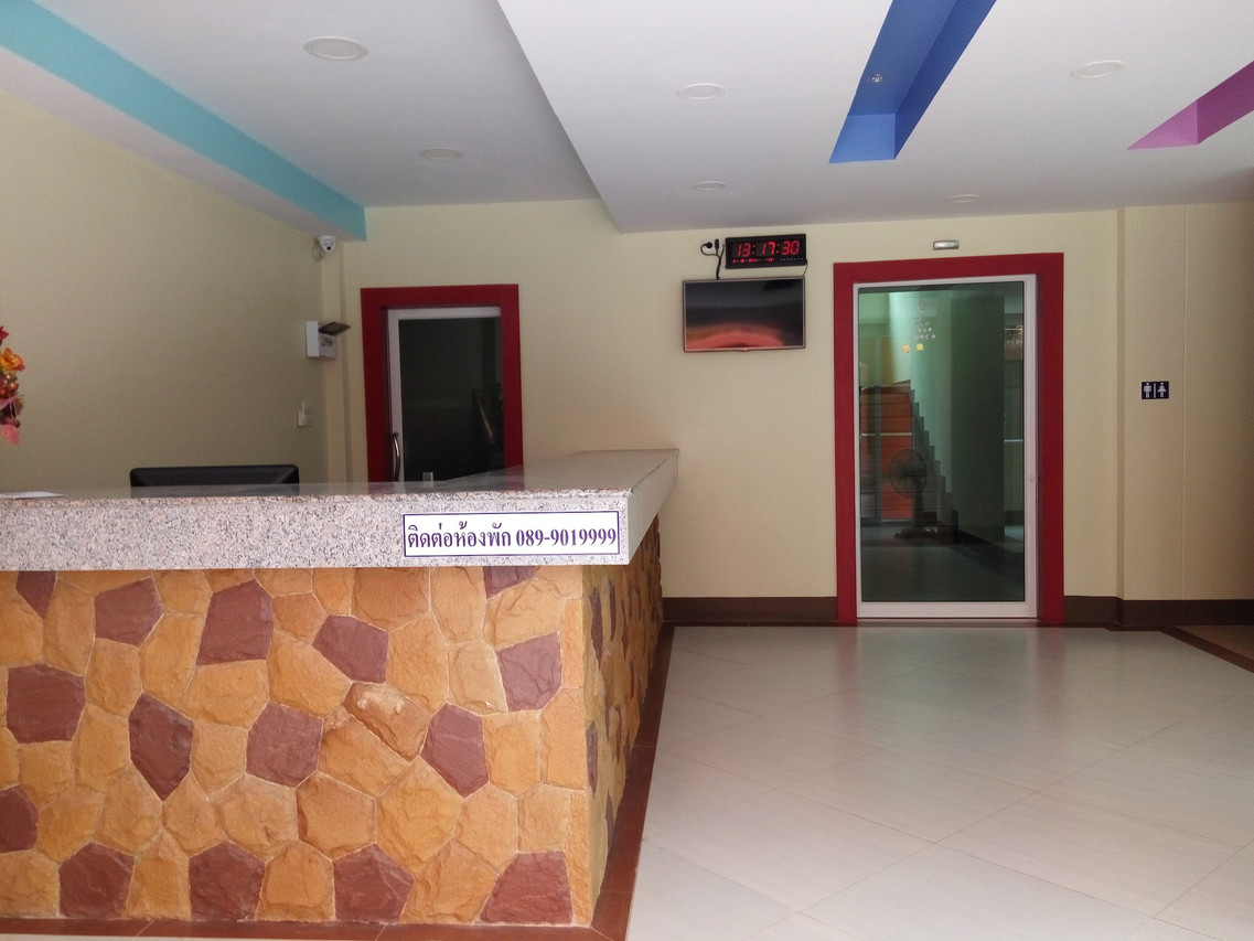 Lobby and reception counter at Central Park Hotel Sing Buri