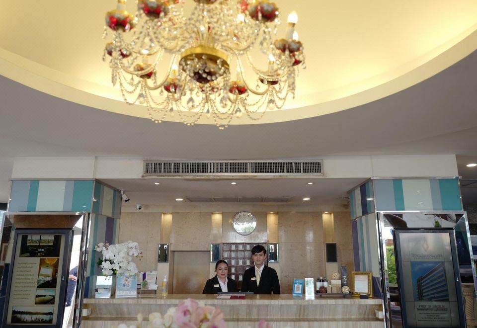 Chaisaeng Palace Hotel lobby with crystal chandelier and reception desk