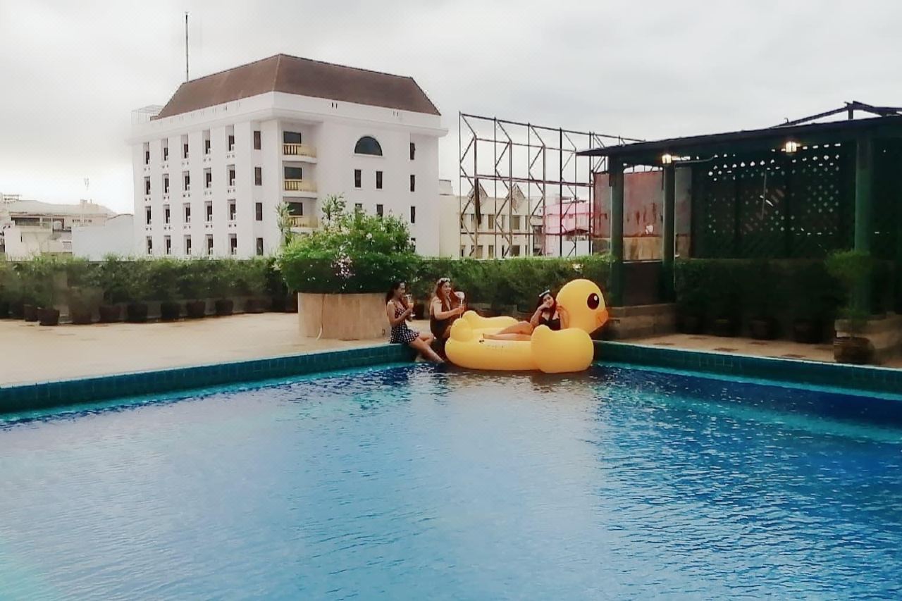 Rooftop outdoor pool overlooking downtown Hat Yai