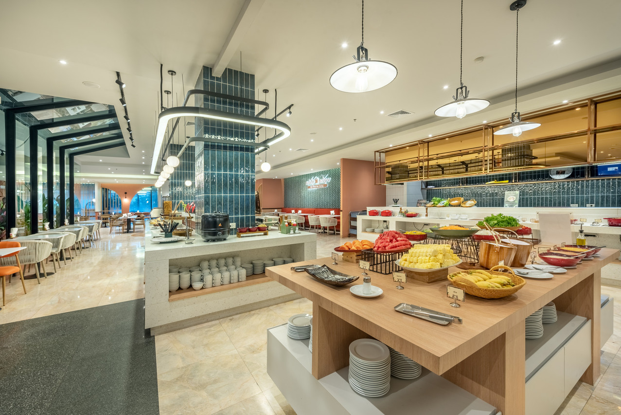 Breakfast buffet with fresh fruit and breads in the hotel restaurant