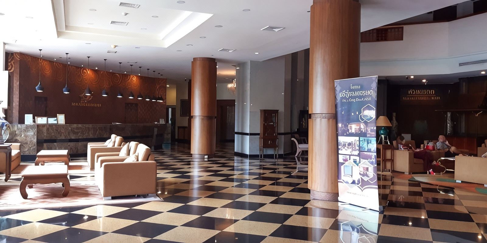 Lobby and reception counter with chequerboard tile floor