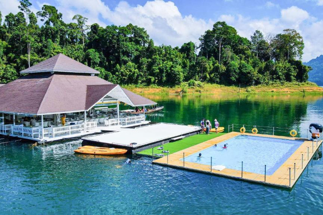 Floating swimming pool and the floating restaurant pavilion on Cheow Lan Lake