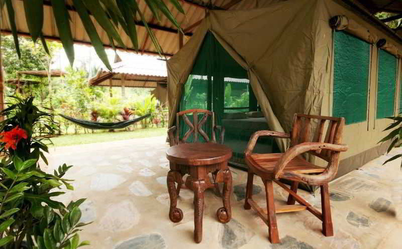 Elephant Hills safari tent with private terrace and hammock in the garden