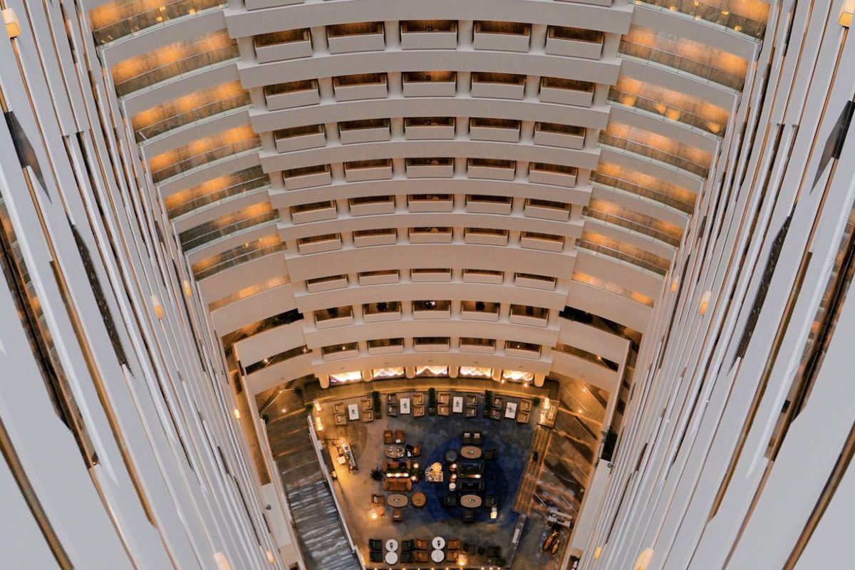 The hotel's porte-cochère entrance among the glass towers of the SIP district, Suzhou