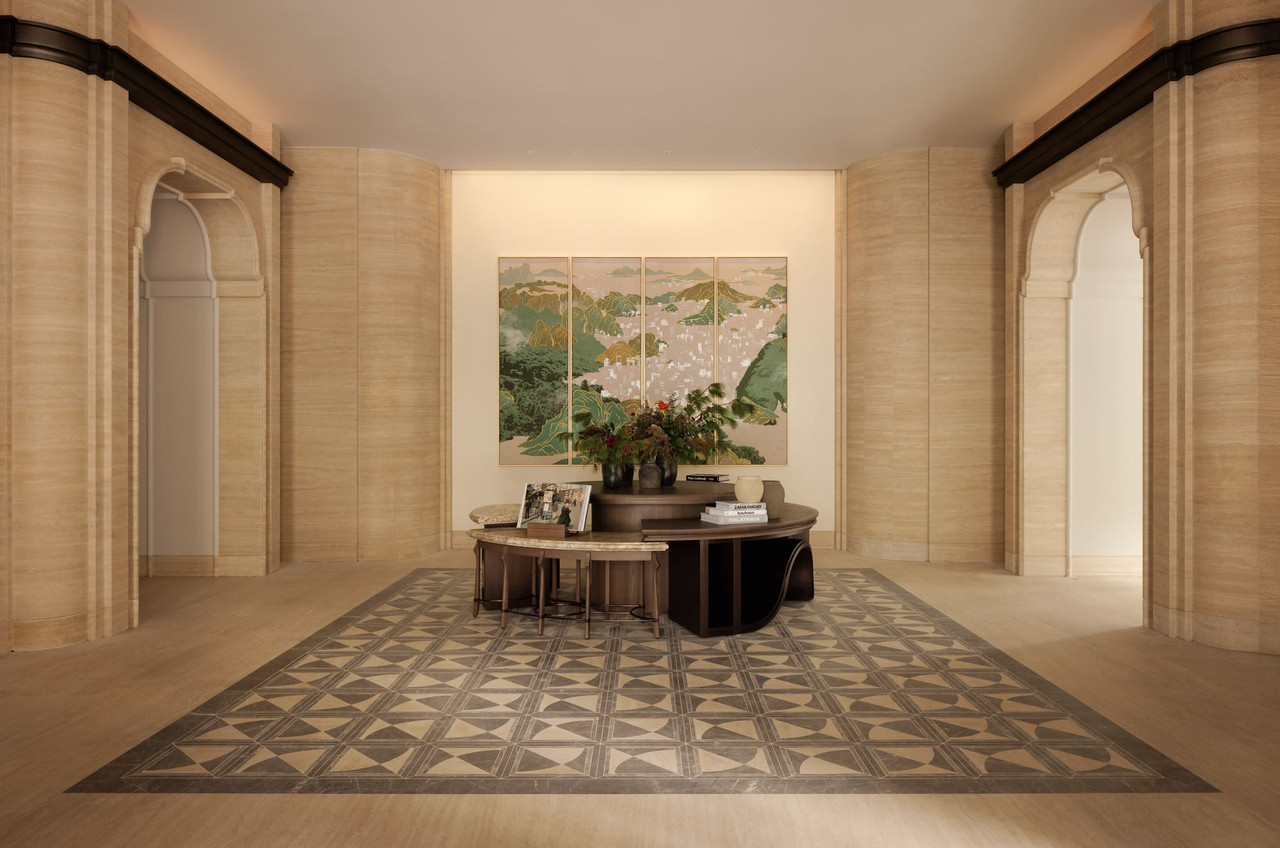 Capella Taipei lobby entrance designed by André Fu Studio, featuring a Taiwan landscape mural and geometric marble floors