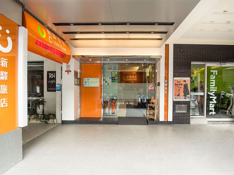 CityInn Hotel I entrance with a FamilyMart next door