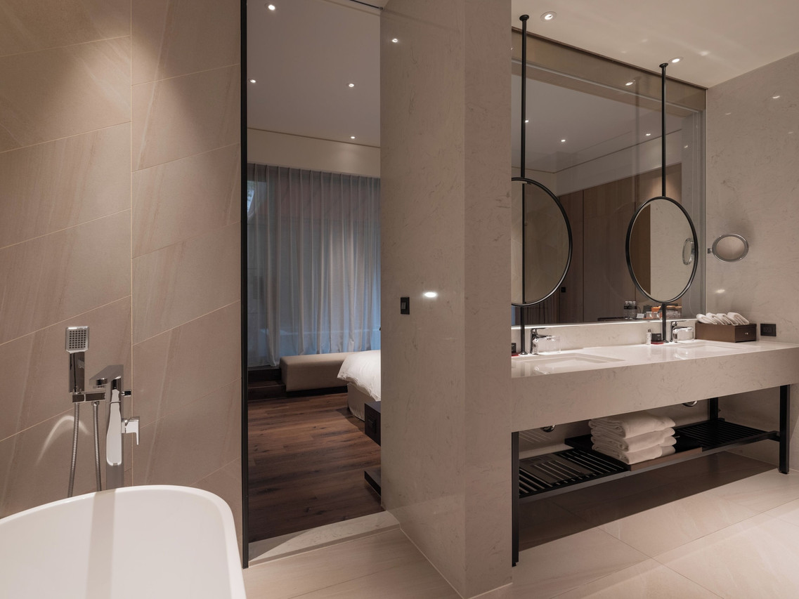 A guest room at Hotel MVSA Taipei in its wine-themed design style